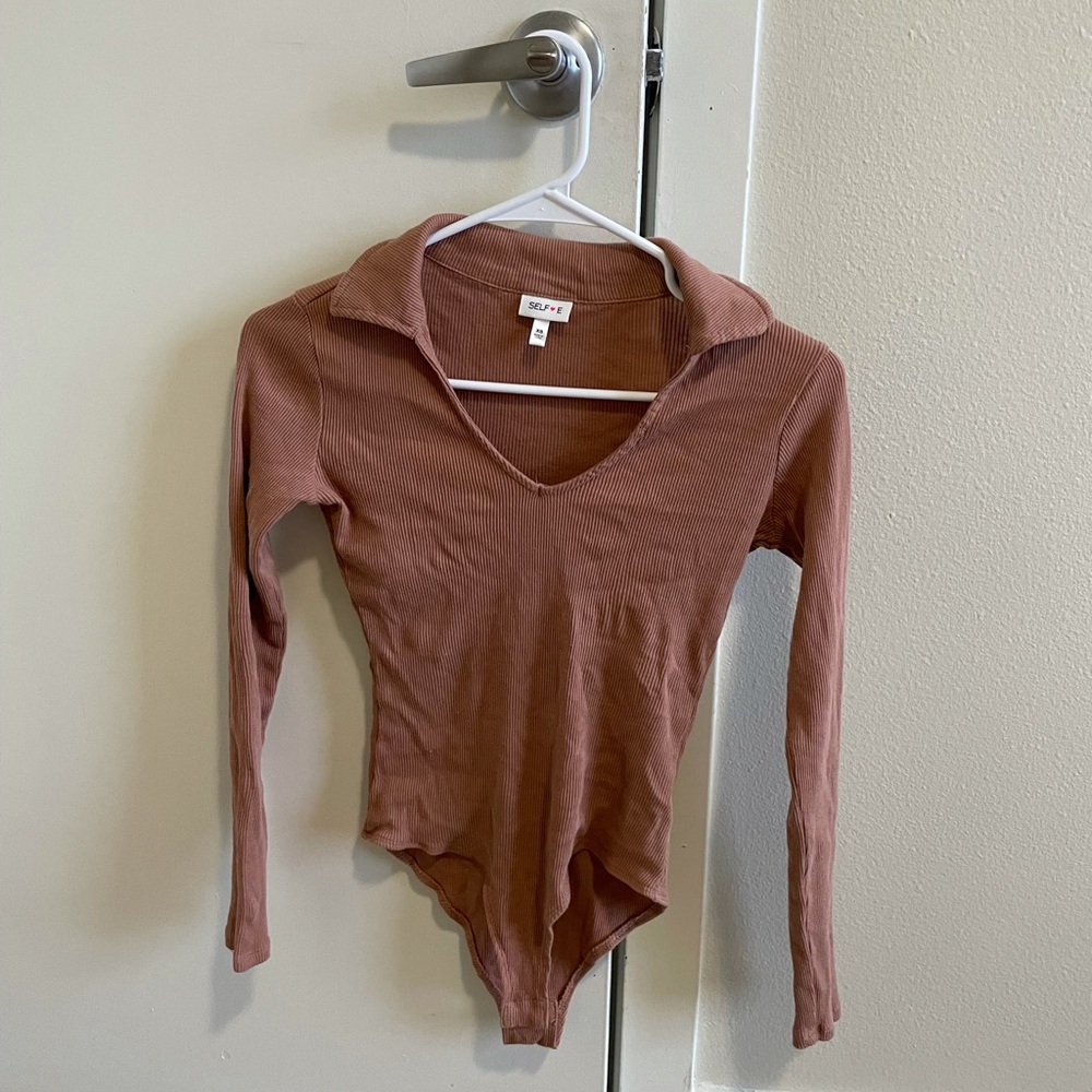 Tan body suit